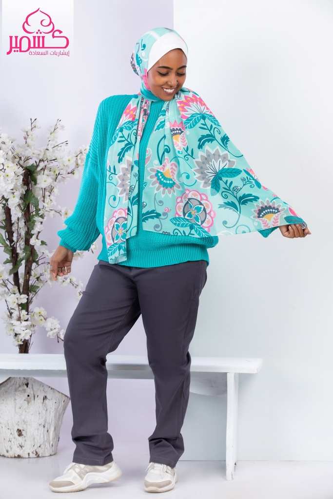 Scarf with gray and pink flowers on a turquoise background