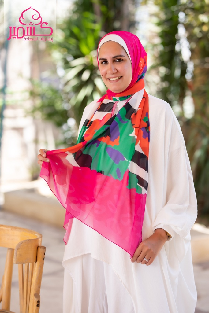 Printed scarf in fuchsia, green, black, white, and orange colors